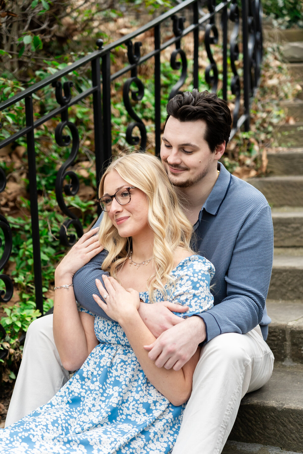 couple embracing during romantic garden engagement photos at Cleveland cultural gardens