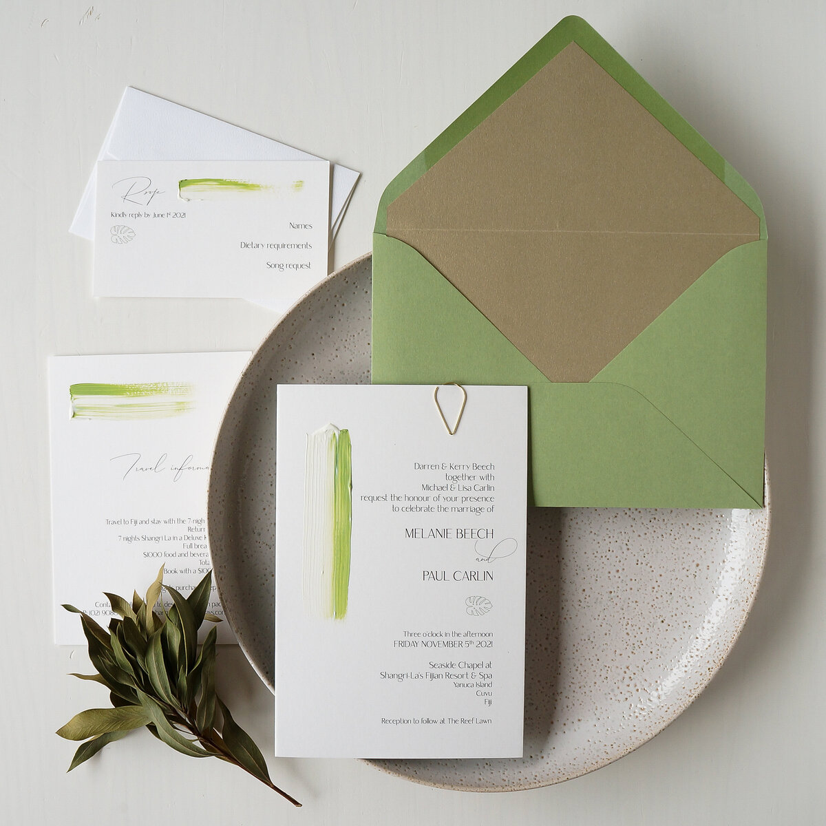 Tropical wedding invitation suite with green and white painting and green and gold envelope