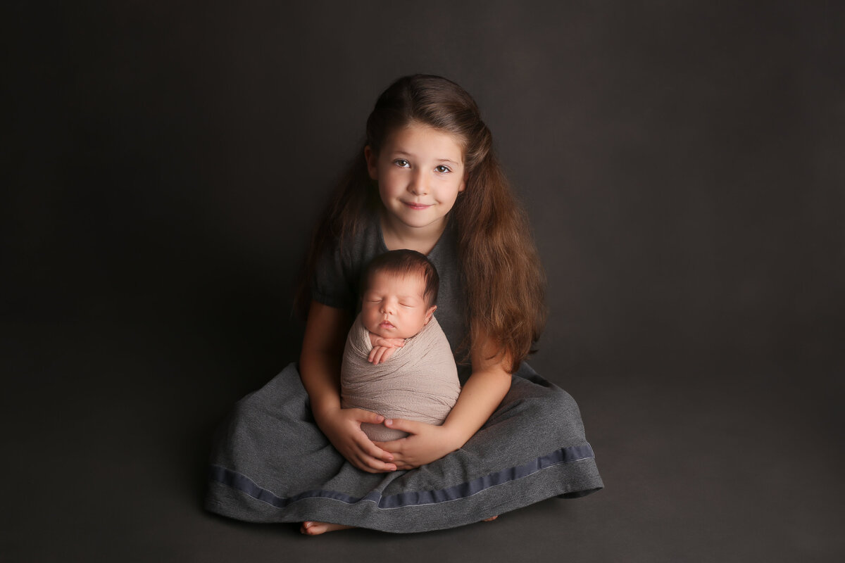 Fine art photo of newborn and sister