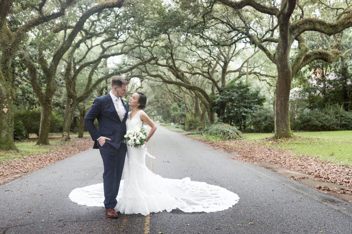 Wedding day photo of bride and groom in Magnolia Springs, Alabama.