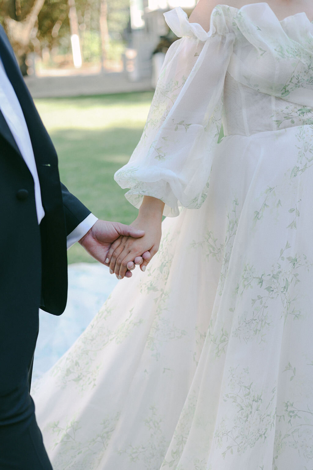 bride-groom-holding-hands