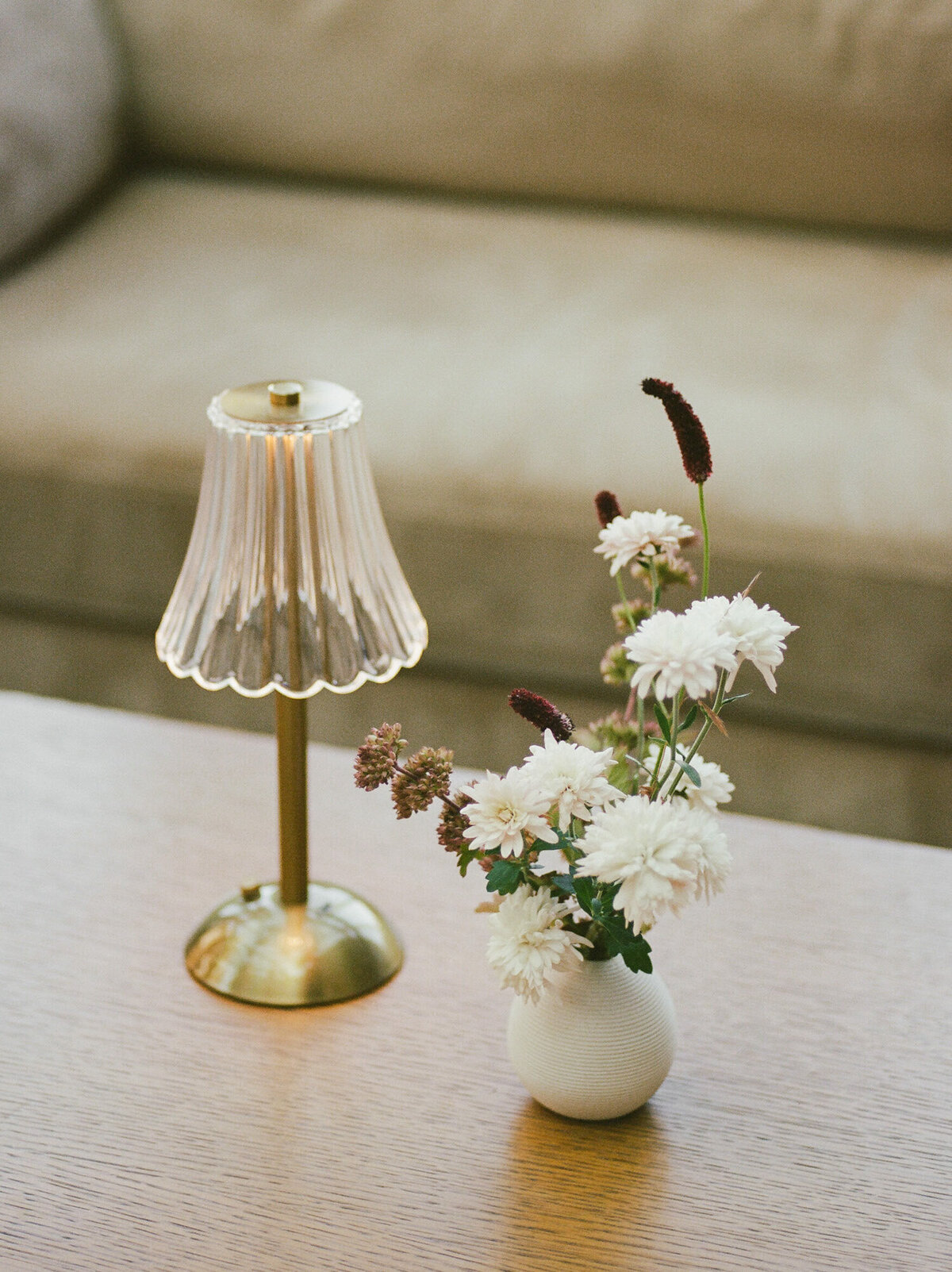 soft film wedding photography of wedding details at Shinola Hotel birdy room, fall wedding flowers