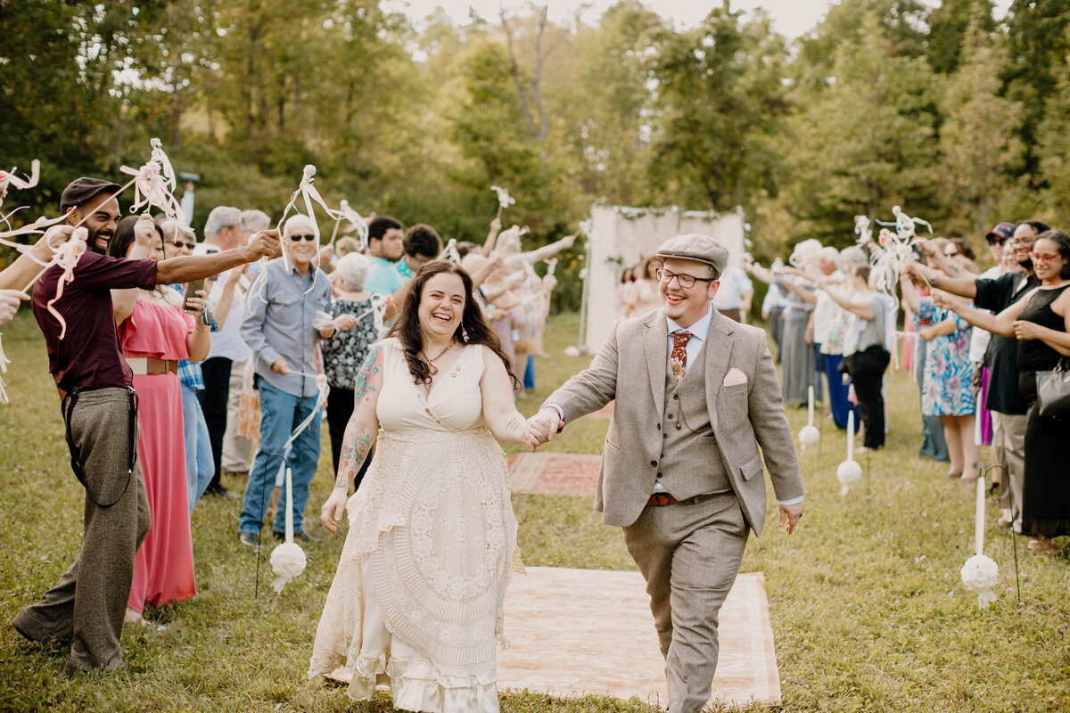 Upstate NY Wedding Photographer, bride and groom down the isle