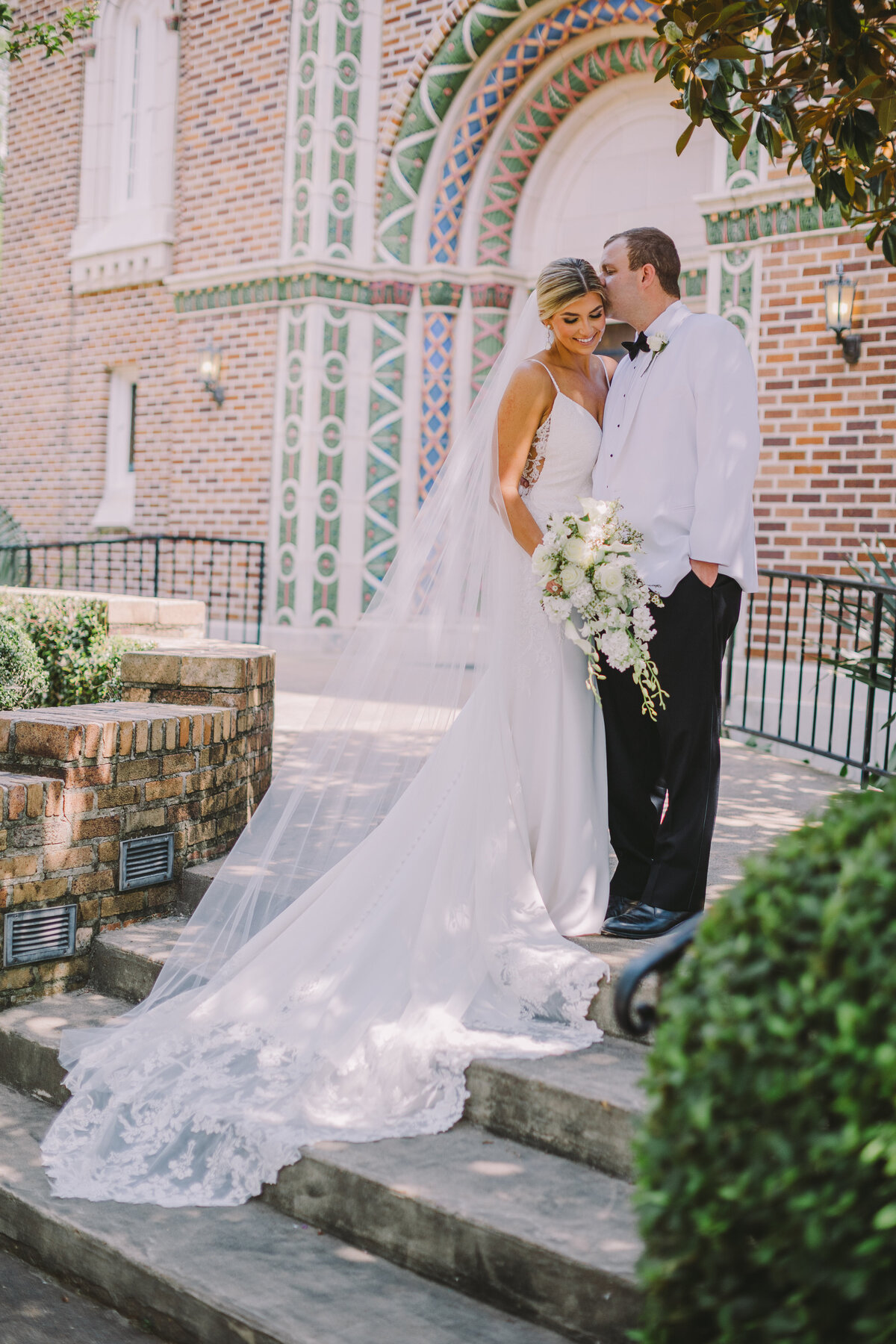 Bride and Groom posing for a portrait in Canton, Mississippi