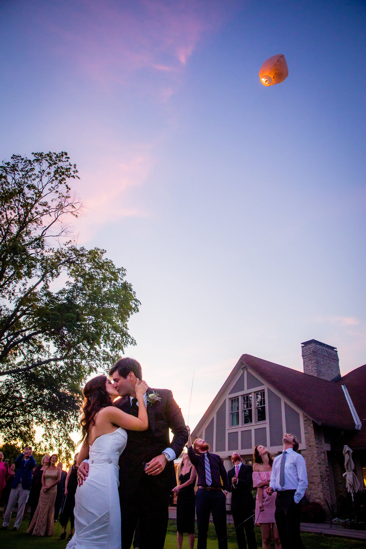 wedding sendoff during sunset at kahkwa club erie pennsylvania