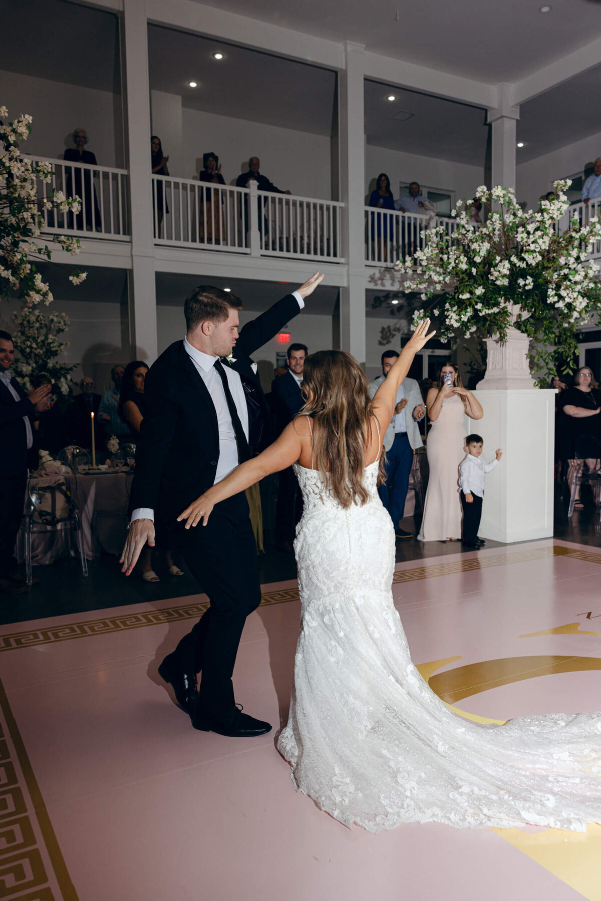 A photo of the bride and groom dancing during the wedding reception
