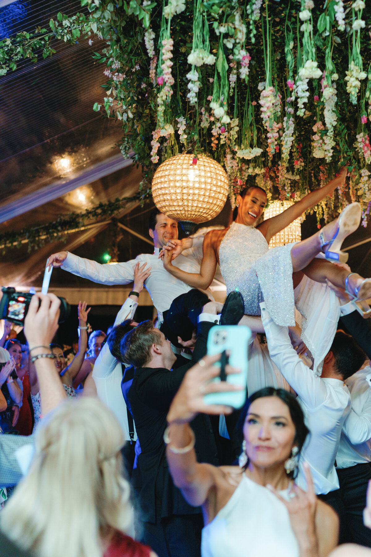 bride_groom_crowd_surfing_ceiling_flowers_party_time_reception_outfit_change_berta_dress_Wedding_kailee_dimeglio_photography-2360