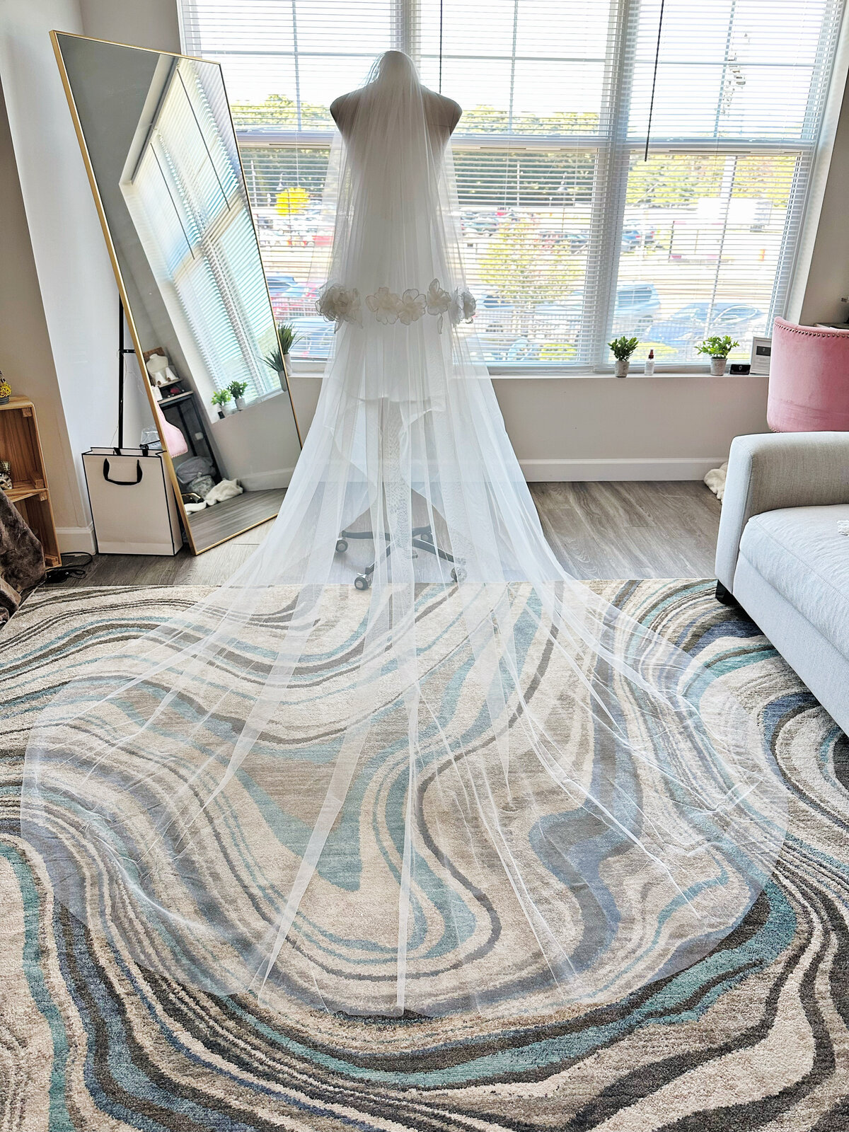 Romantic bridal portrait with soft lace-edge blusher veil
