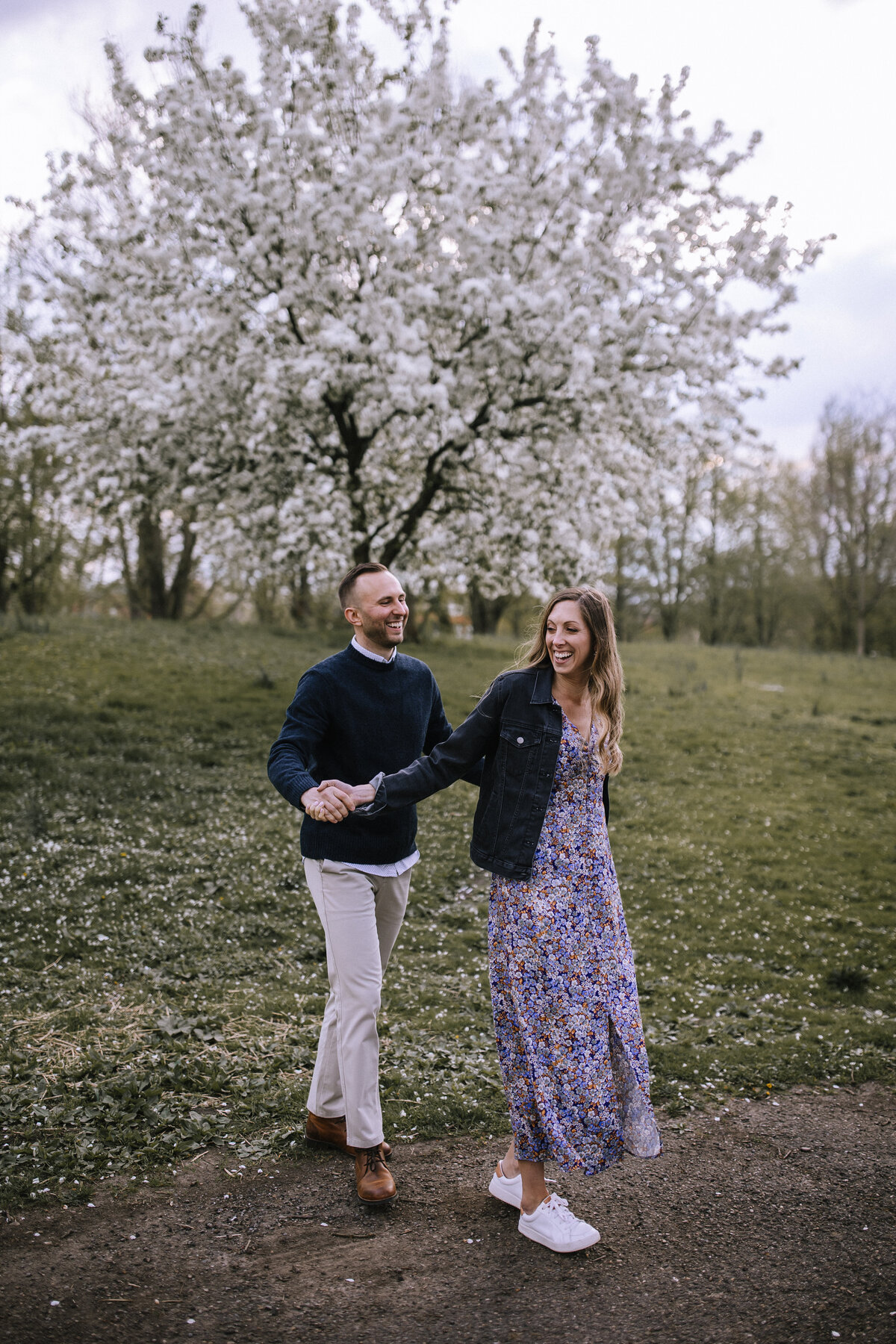 Engaged couple in the Allegheny Commons Park in springtime. 
