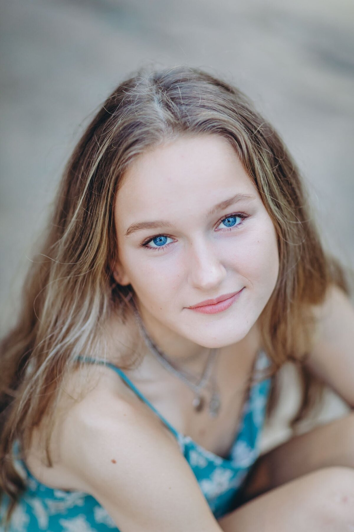 Beautiful closeup portrait of a girl with stunning blue eyes.