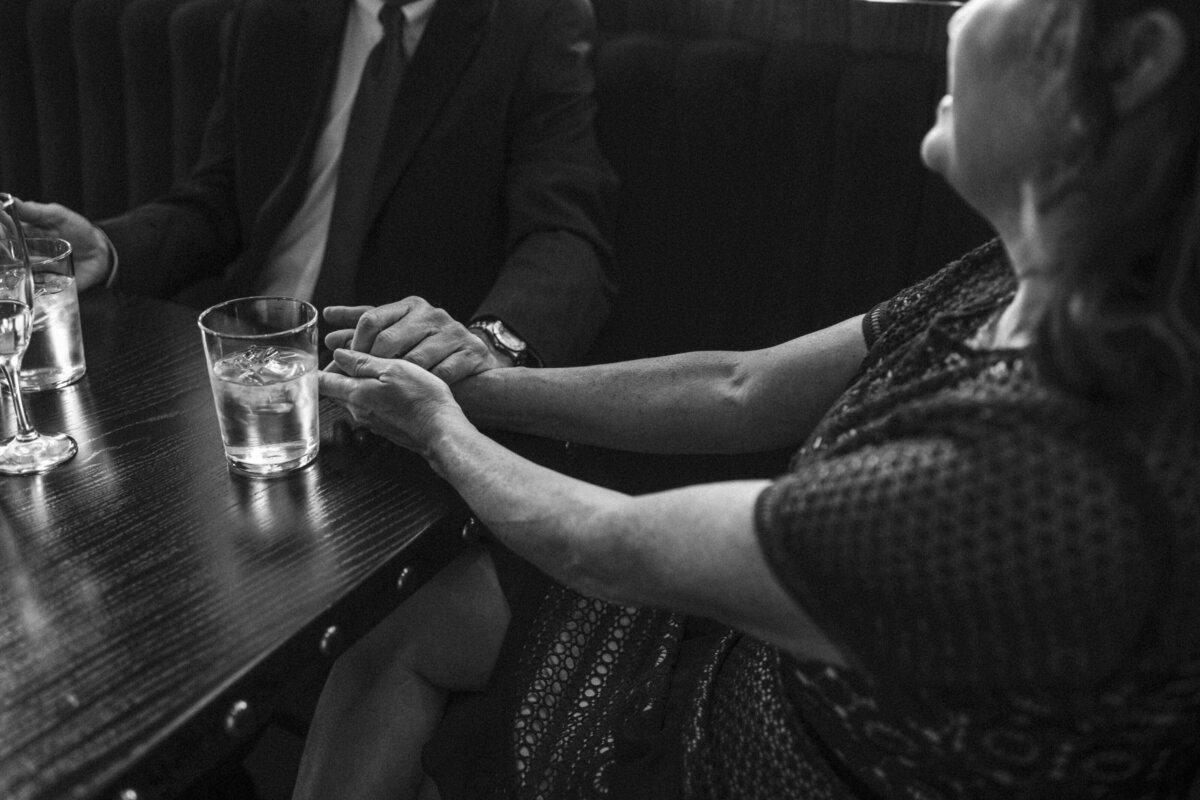 old-couple-holding-hands