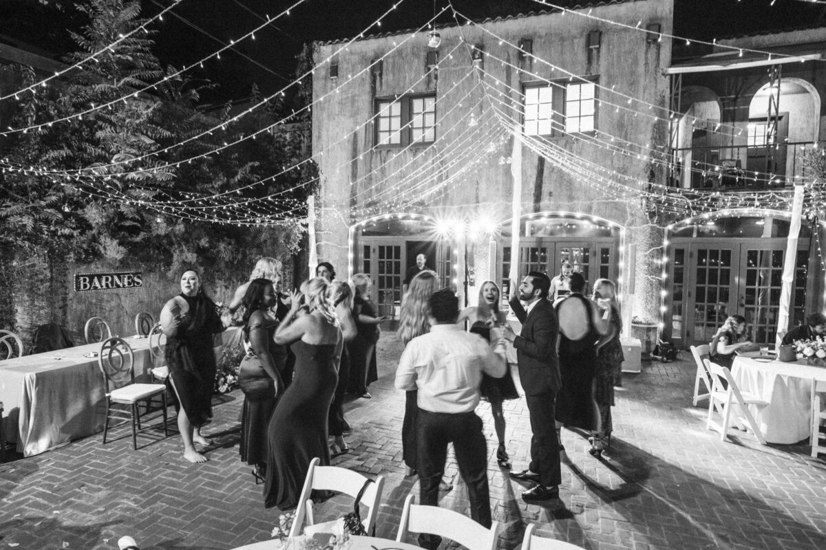 guests-dancing-under-twinkle-lights