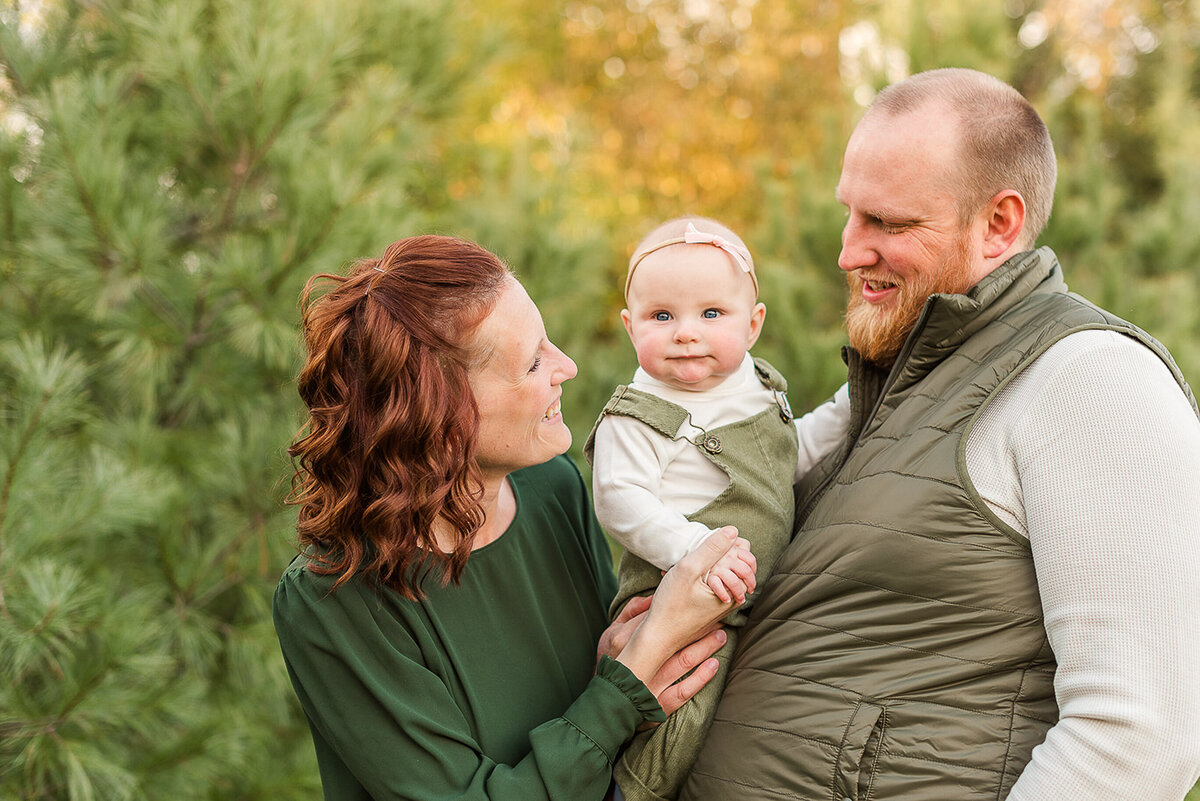 Stone bridge surrounded by golden trees during fall mini session at Lititz Springs Park Lititz, PA
