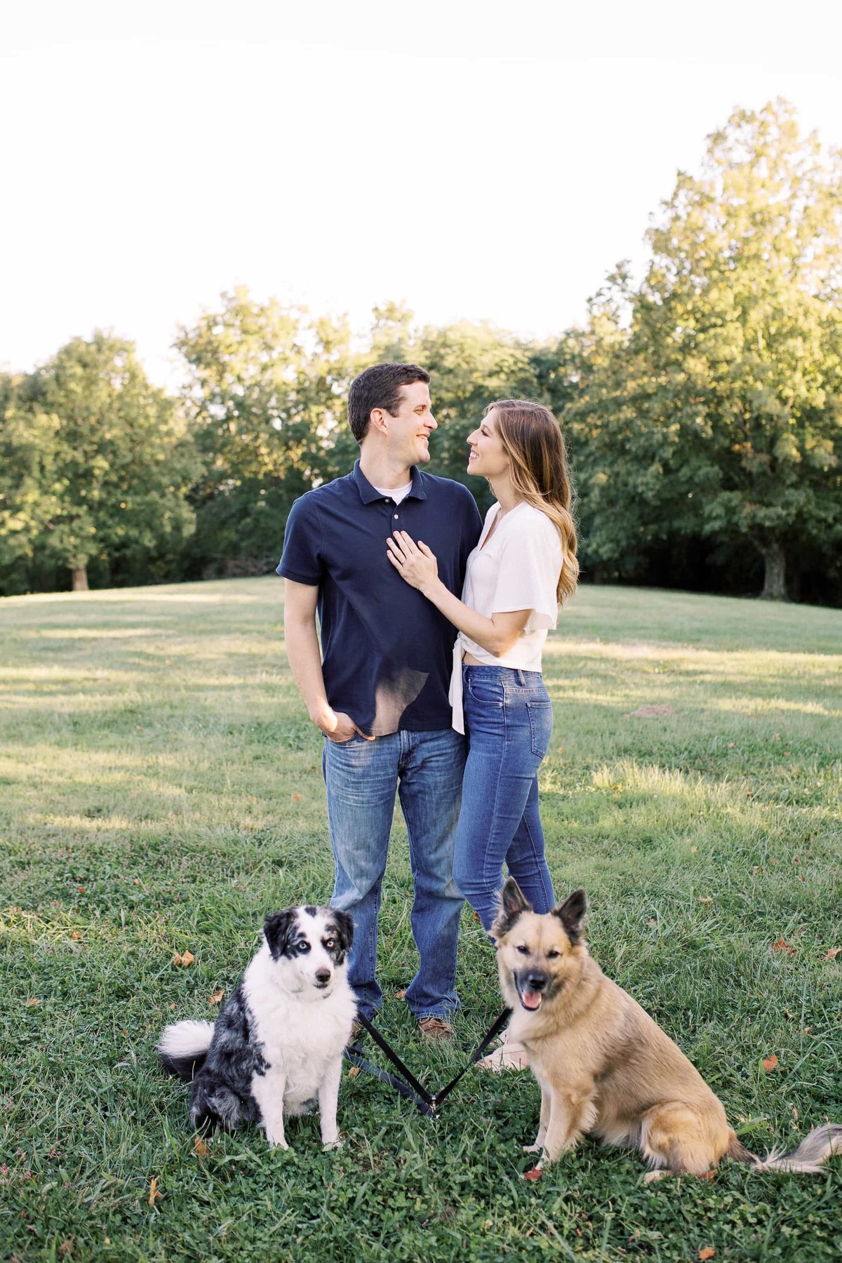 A couple during their engagement session with their dogs in Cincinnati, Ohio