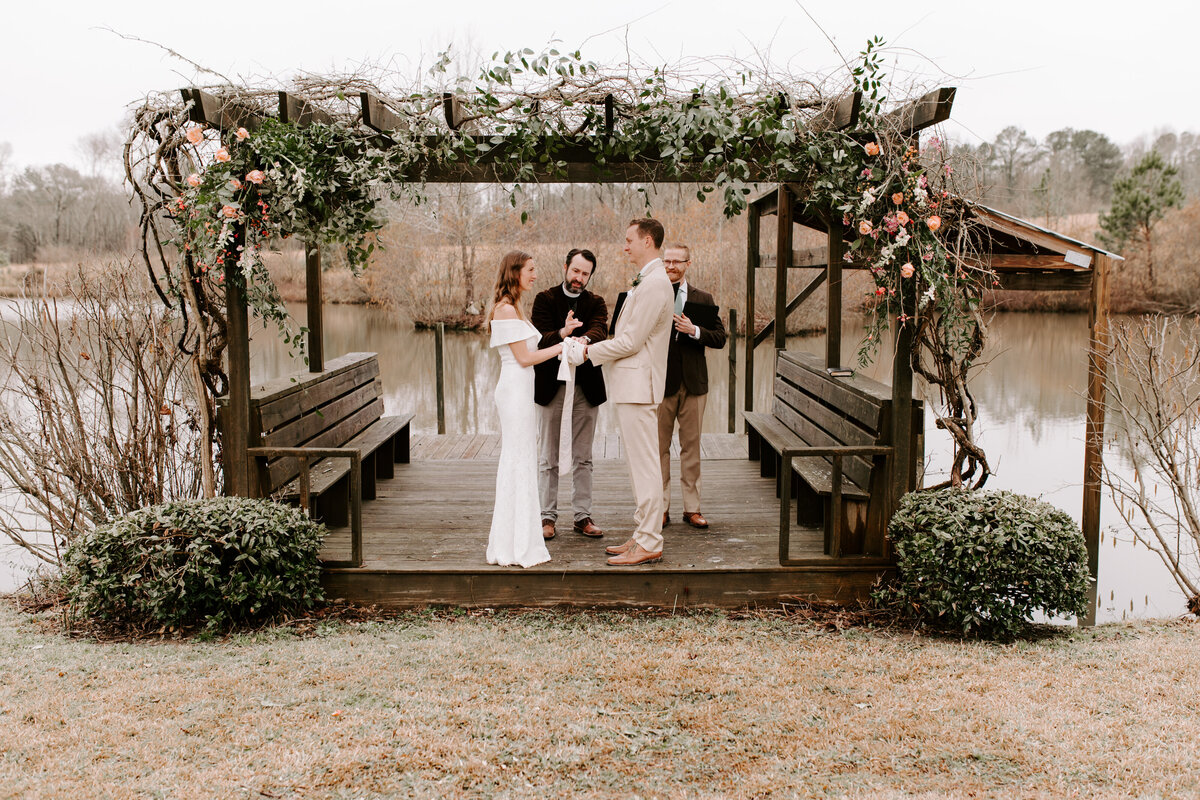 Wedding ceremony by a lake