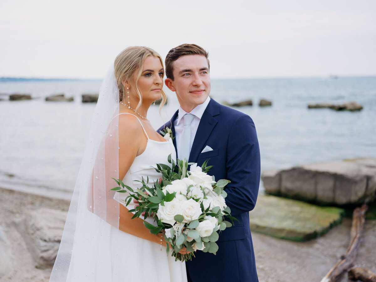 Bride and groom by the water at Cleveland Yachting Club