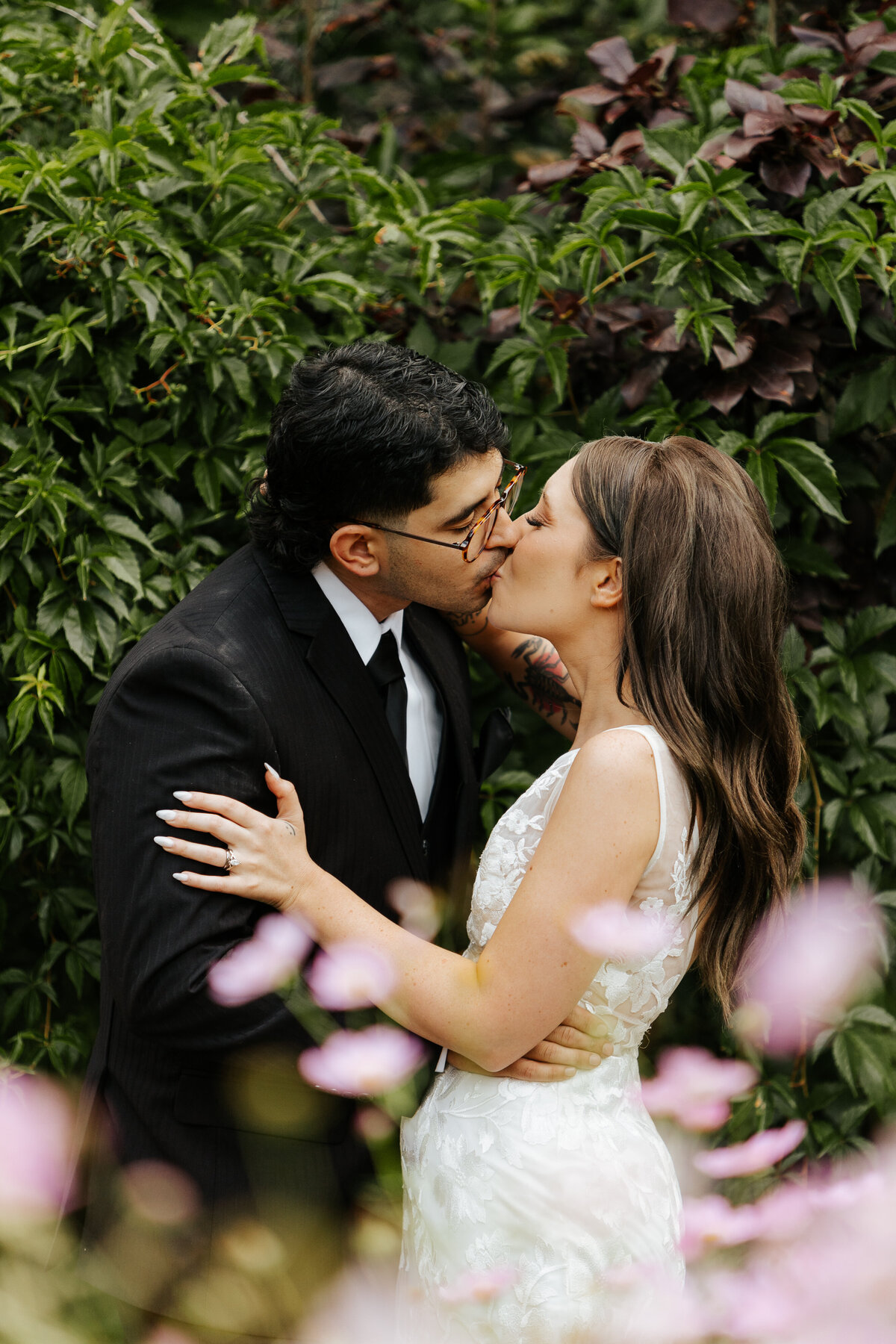 A bride and groom share a kiss during their Colorado Wedding.