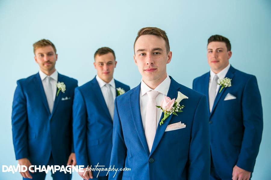 Groomsmen stand with groom at a Sandbridge wedding