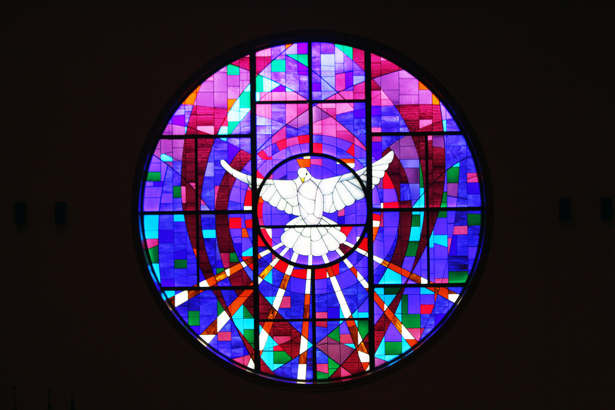 An up-close shot of Bartlett Chapel's stained glass window in the sanctuary