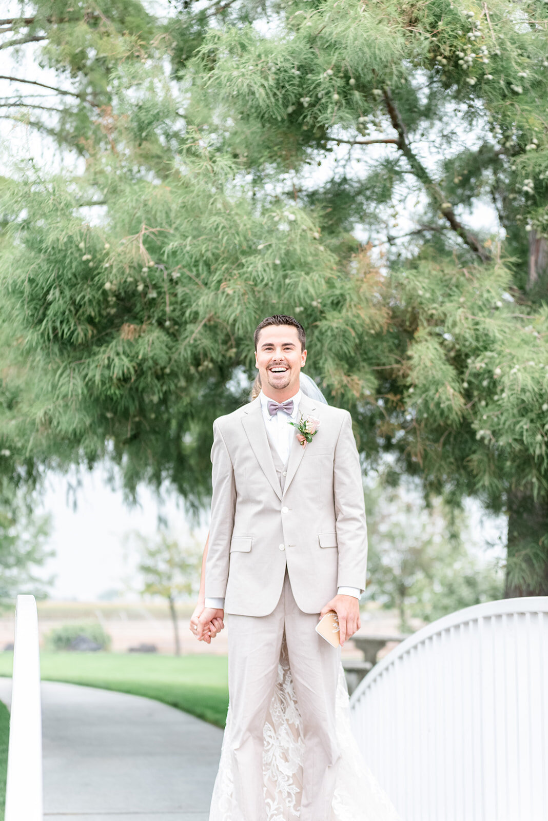 Bride and groom back to back reading vows, Light and airy wedding photography by the Best Boise Wedding Photographers