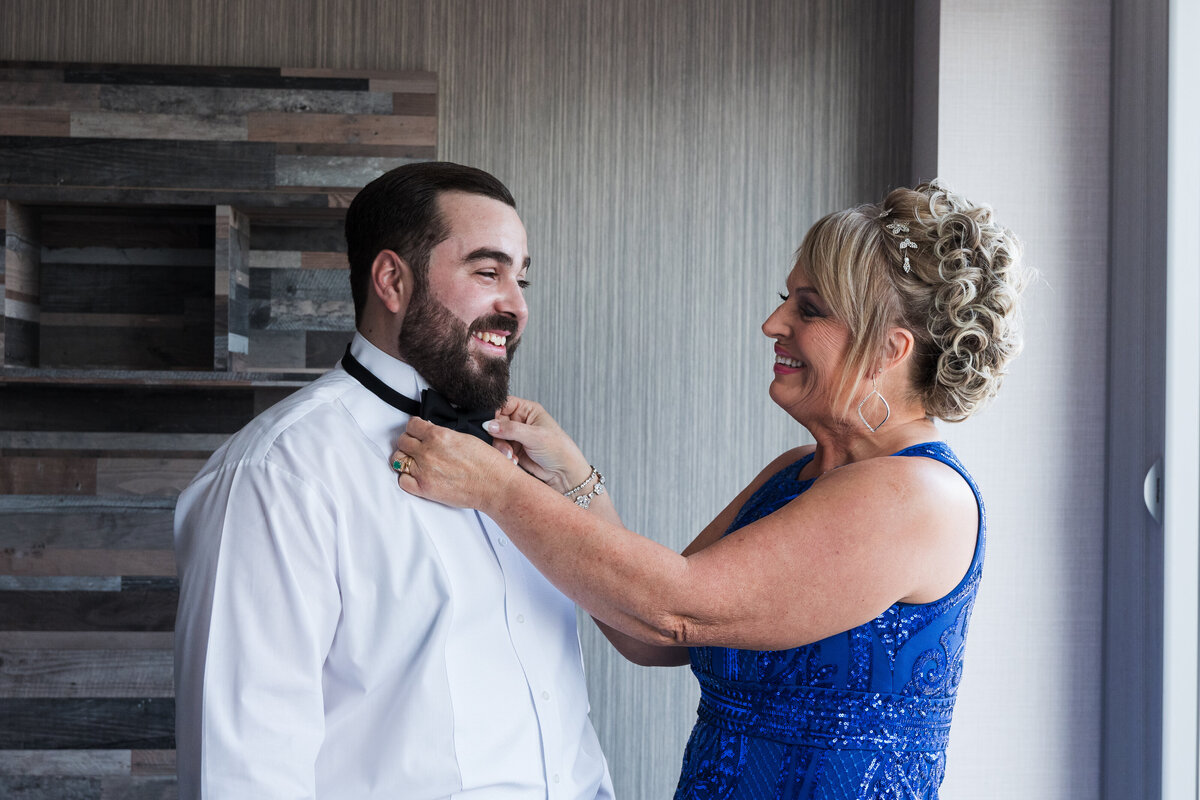34 groom's-mom-helping-son-get-dressed