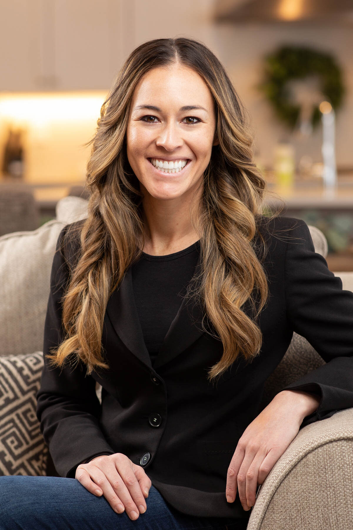 Real estate agent taking portrait in a home in South Jordan, Utah.