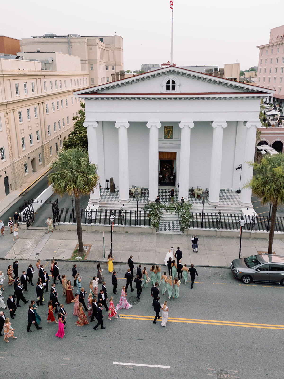 Classic Charleston Wedding processing down Meeting Street to Hibernian Hall by Sarah Bradshaw 0195