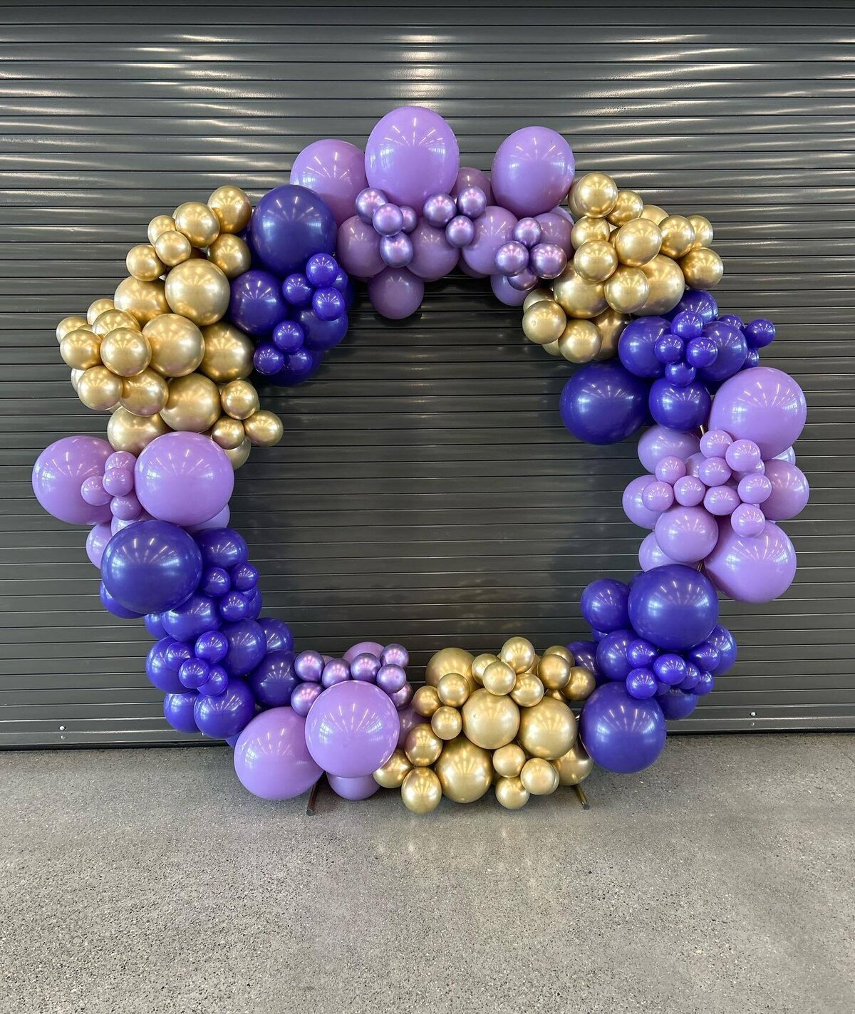 purple and gold balloon arch circle wreath