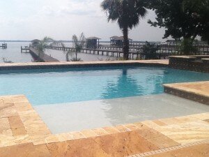 Custom pool build with tanning ledge Jacksonville