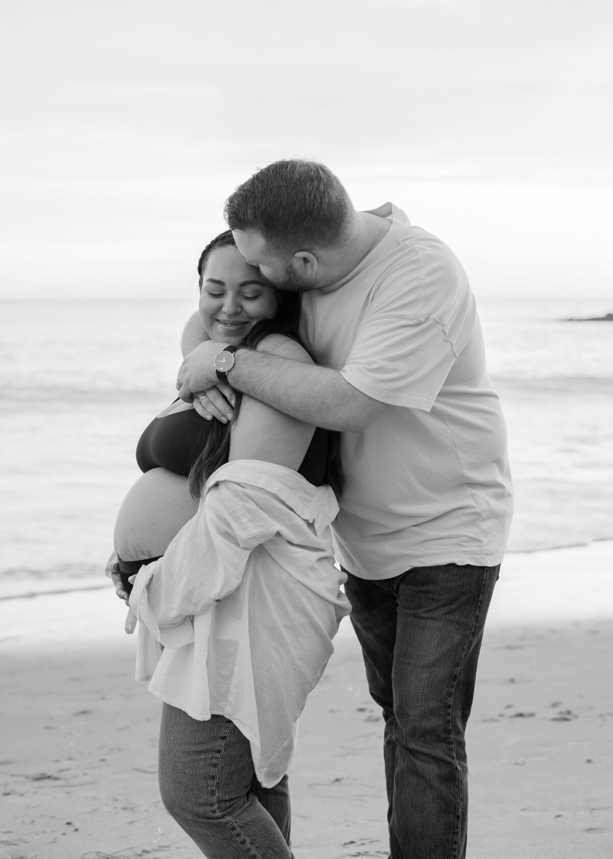 romantic black and white maternity photos in laguna beach