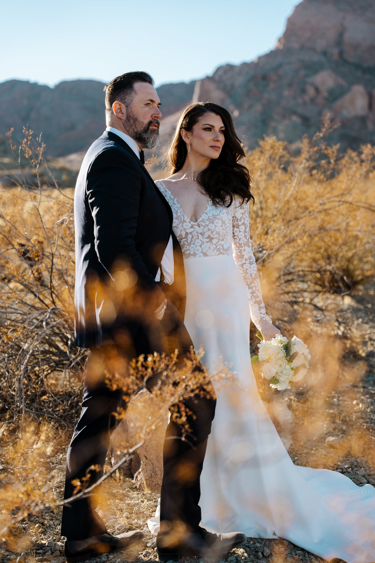bride and groom in the desert at nelson ghost town, just outside of las vegas, nv