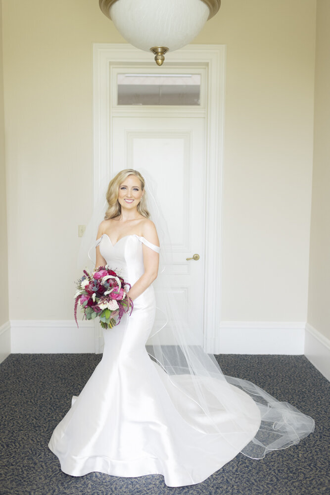 bride with her wedding flowers - Wadsworth Mansion wedding photographer Rachel Girouard