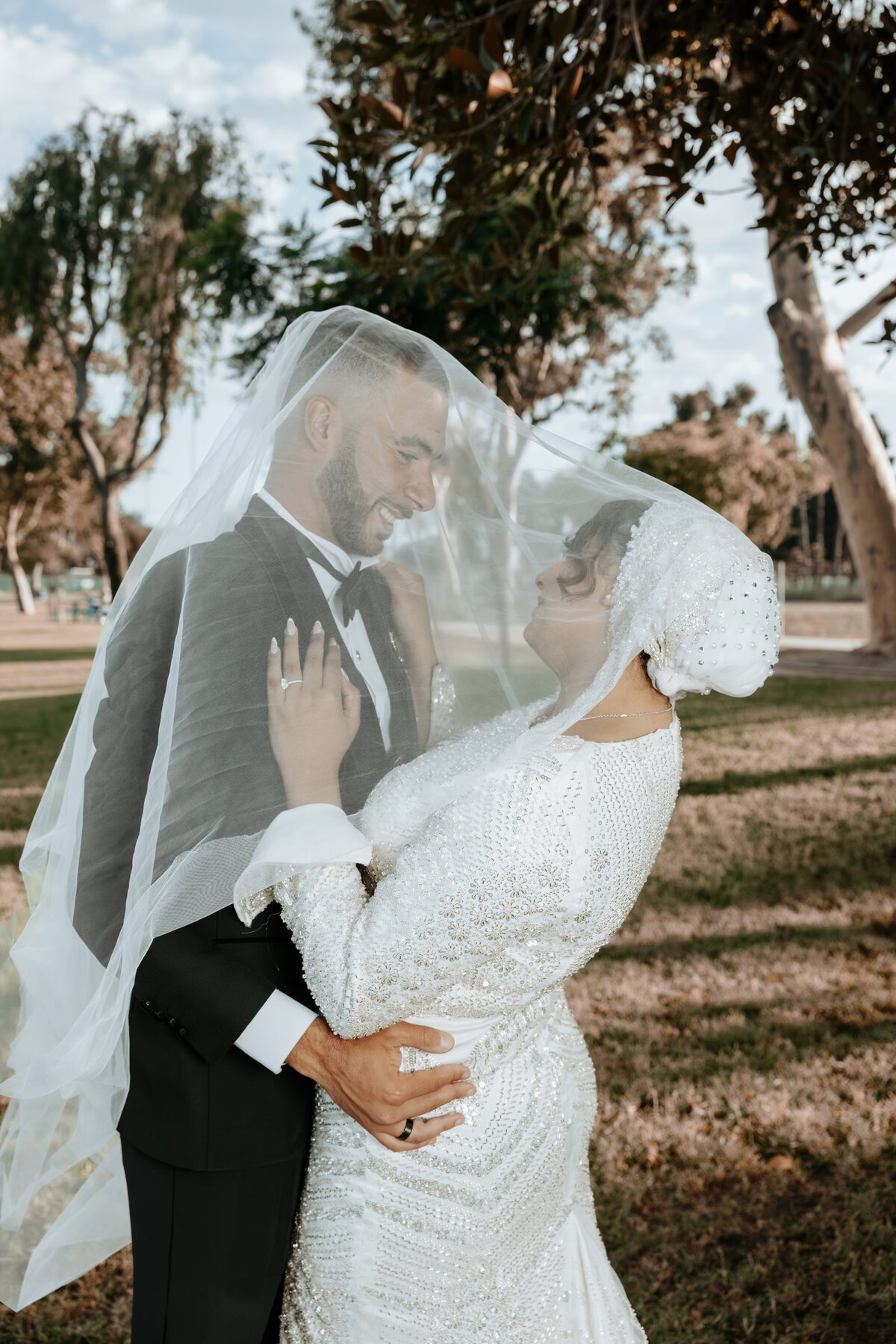 Veil-Covered Wedding Kiss – Arabian Wedding Photography in Los Angeles