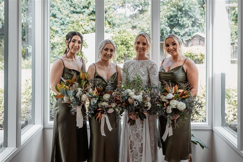 Capture the essence of timeless beauty with our stunning bridal bouquets. Picture this: a radiant bride surrounded by her enchanting bridesmaids, each holding a meticulously crafted bouquet of exquisite flowers.