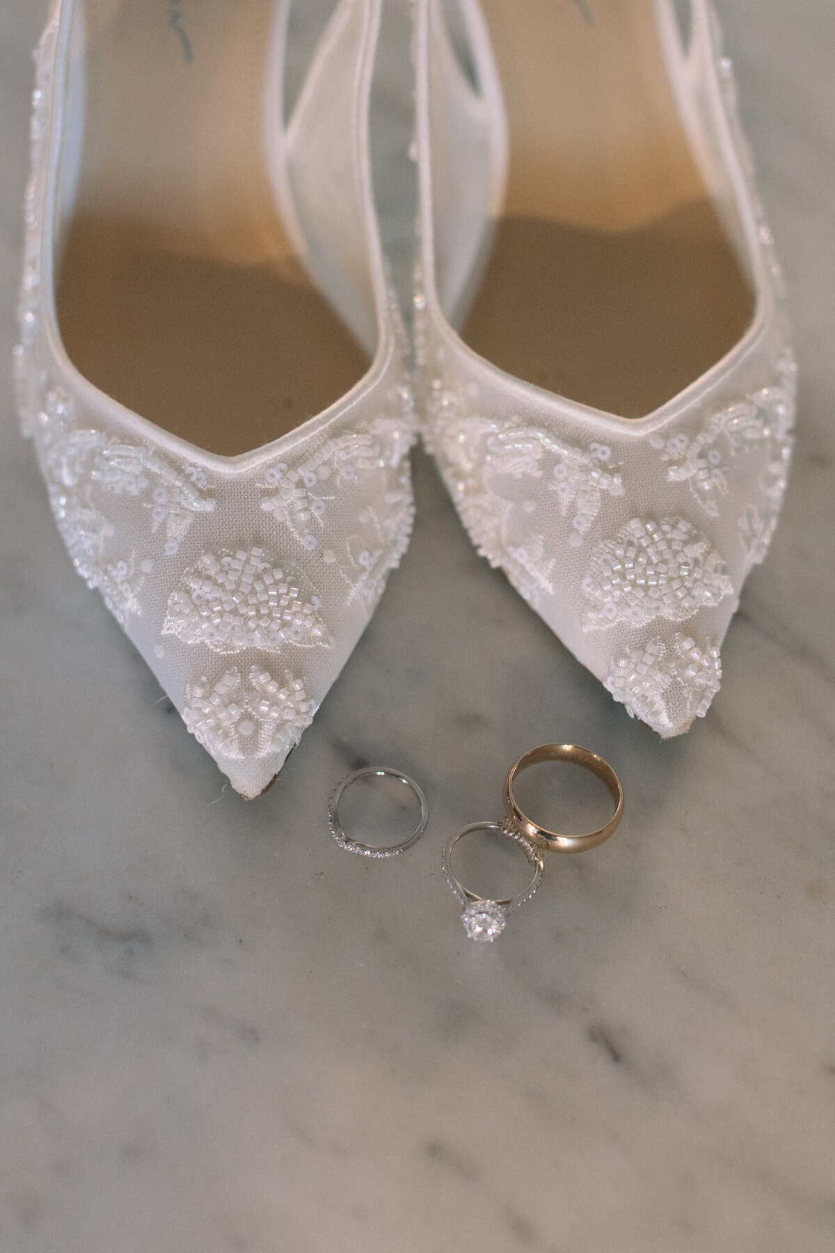 Betsey Johnson lace bridal shoes, veil, and rings styled for detail photo at Springfield Manor.