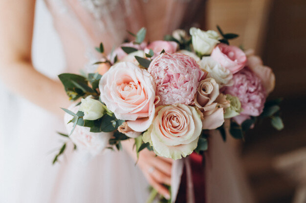 brides-wedding-bouquet-with-peonies-freesia-other-flowers-women-s-hands-light-lilac-spring-color-morning-room_91924-139