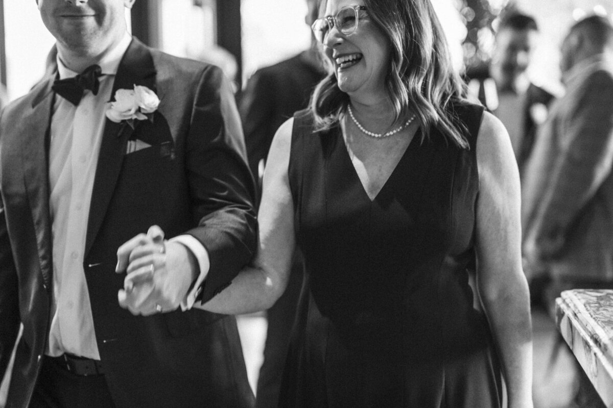 mother-of-groom-holding-hands