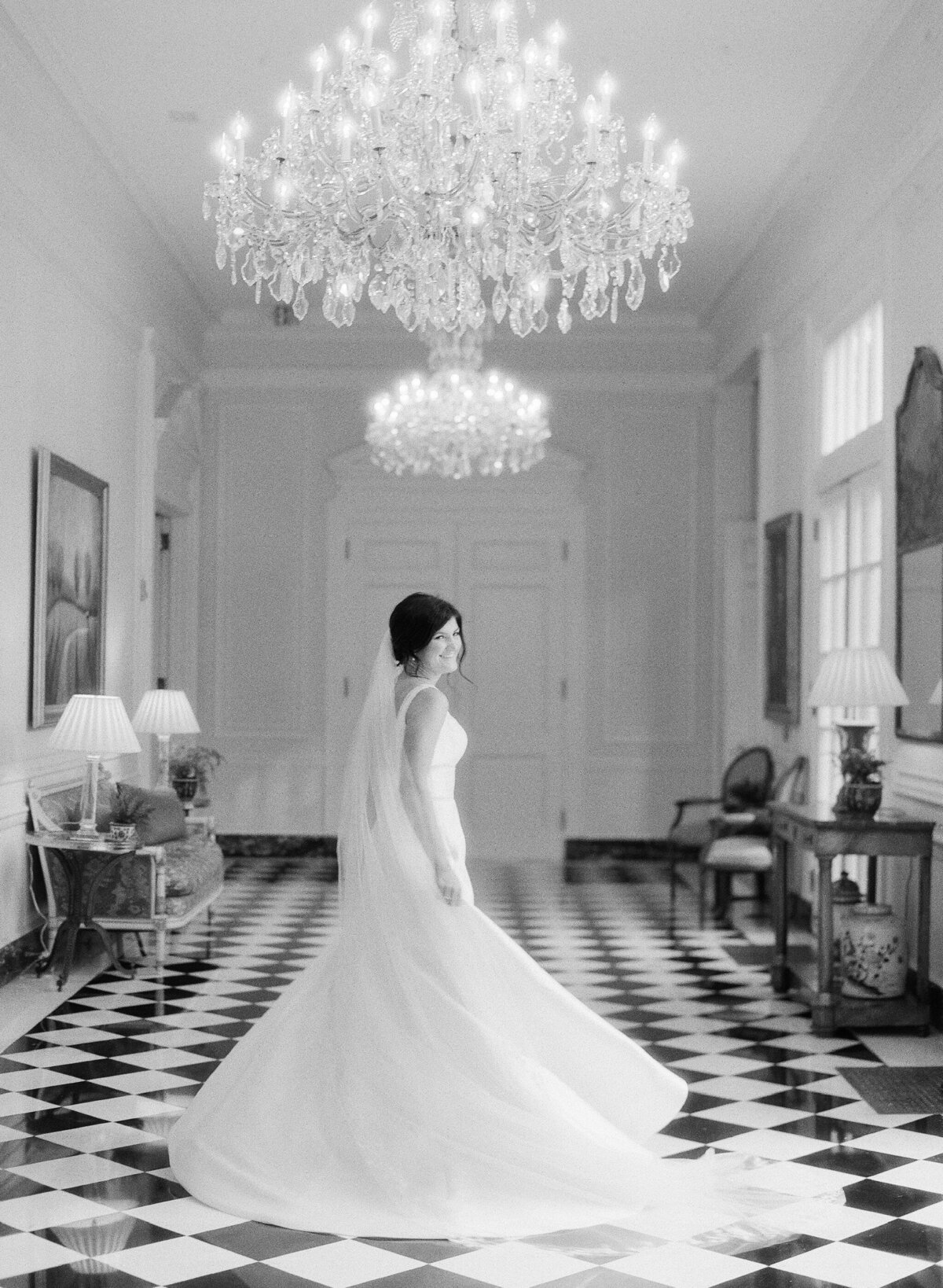 Bride twirling in hallway of Duke Mansion
