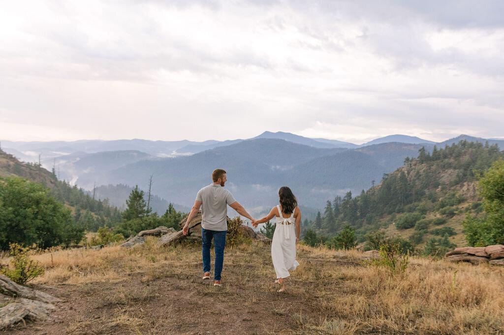 Breathtaking mountain summer engagement photos at Mt Falcon West in Indian Hills, Colorado