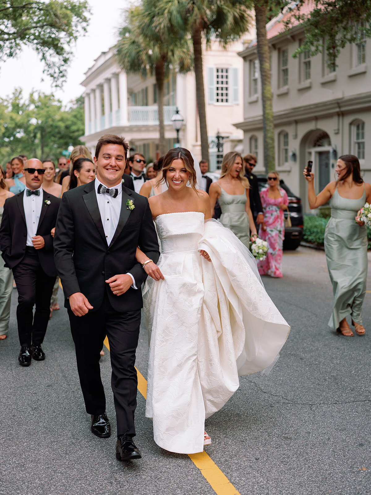 Classic Charleston Wedding processing down Meeting Street to Hibernian Hall by Sarah Bradshaw 0190