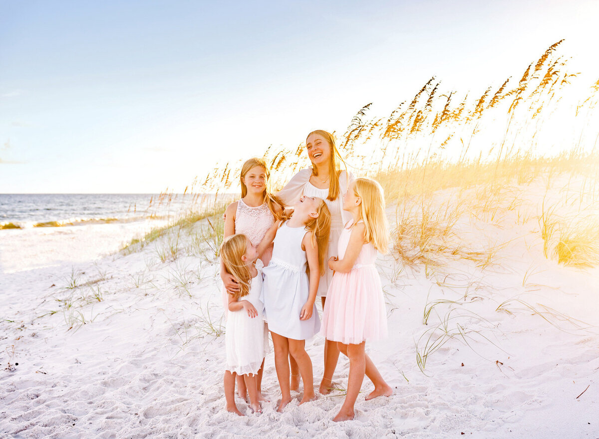 sisters-laughing-together-navarre-beach-photographer