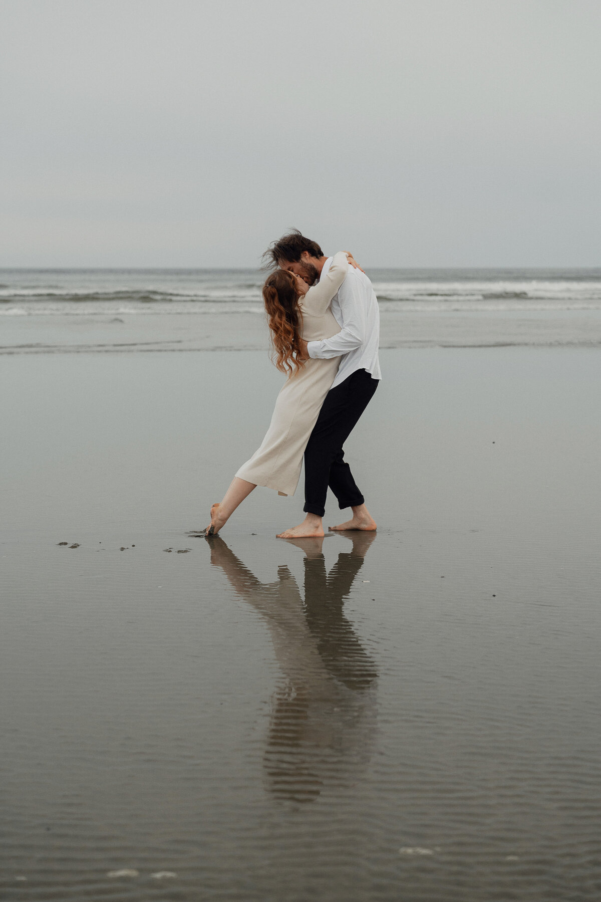Proposal photos on the beach in Tofino by Latitude 49 Photography