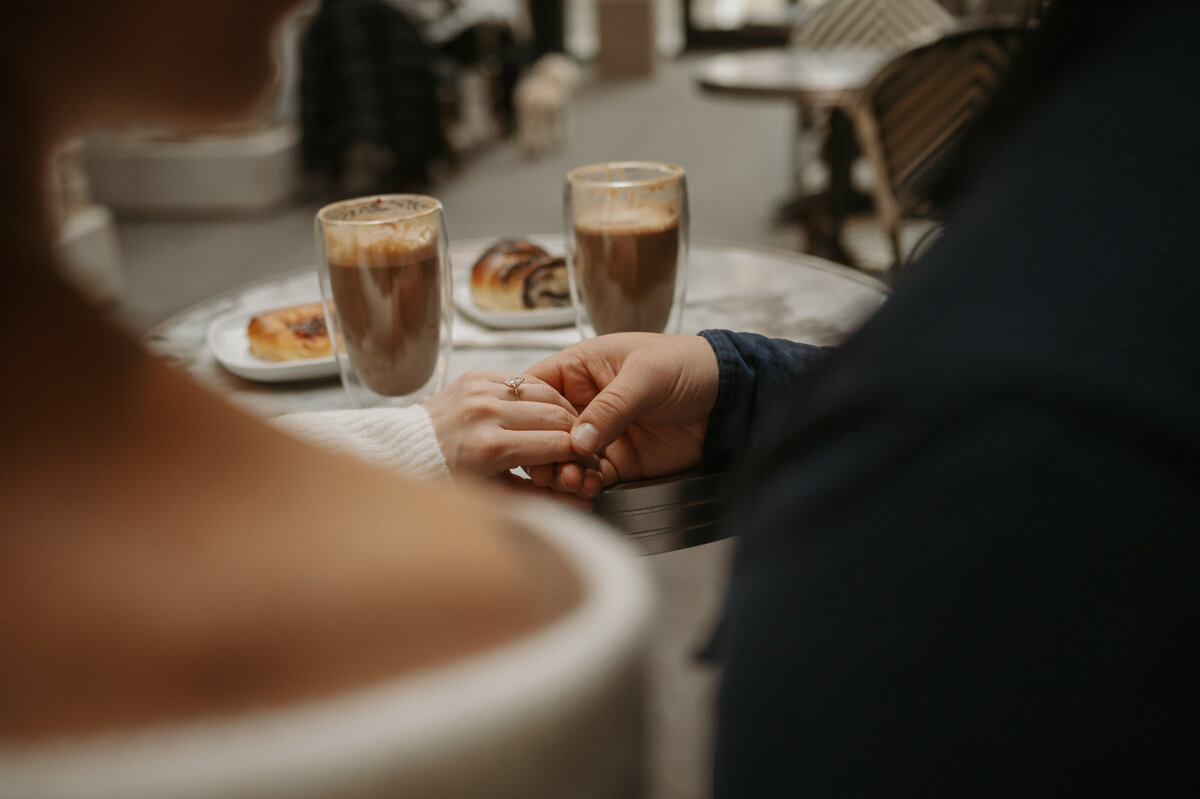 Engagement ring photograph taken at local Edmonton coffee shop