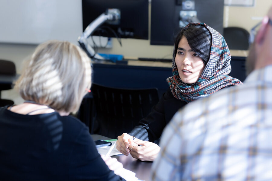 Woman interviewing for a job at a career summit.