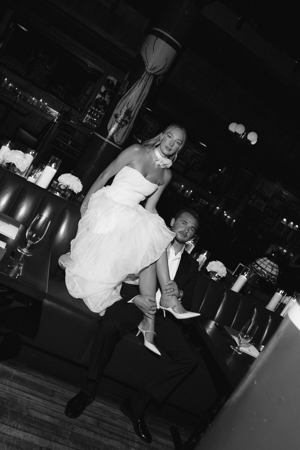 Sophisticated editorial wedding photography captures reception celebration at Trivoli Tavern Chicago, featuring Lauren Alatriste's fashion forward approach combining magazine-worthy imagery with celebration elegance and authentic wedding
emotion.