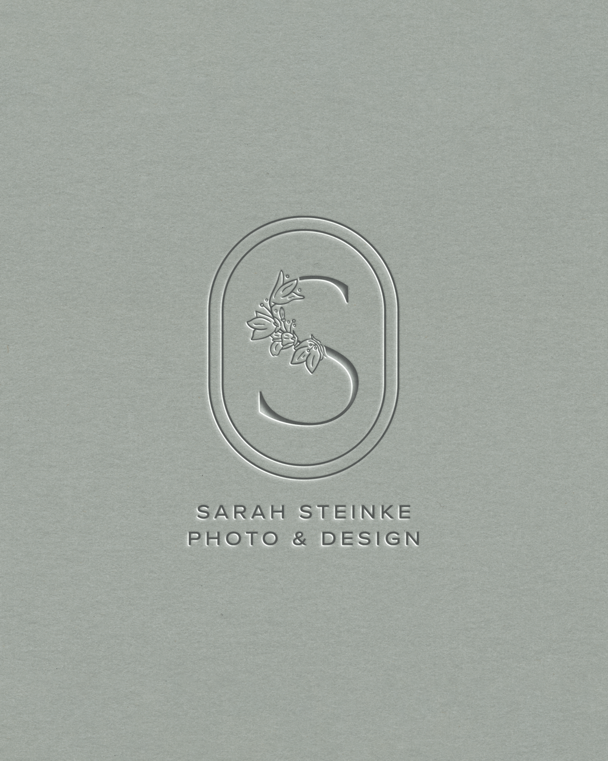 luxury photographer branding featuring an elegant, serif font and subtle floral elements