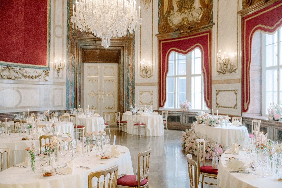 Elegant dining room at palace Daun Kinsky executed for US Destination wedding couple by ÈCLAT Destination Weddings