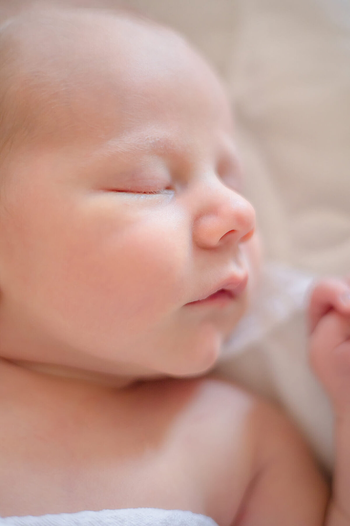 Sleeping newborn baby boy