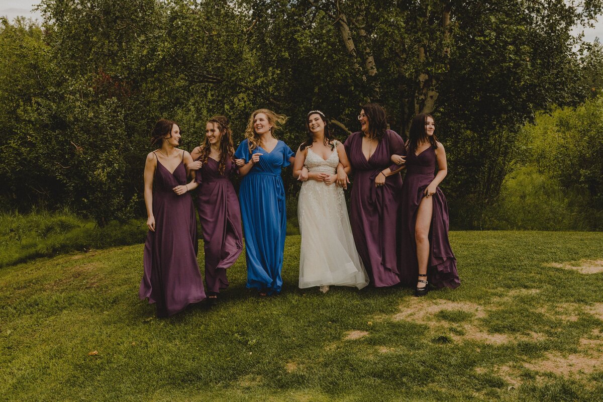 A bride party walks together