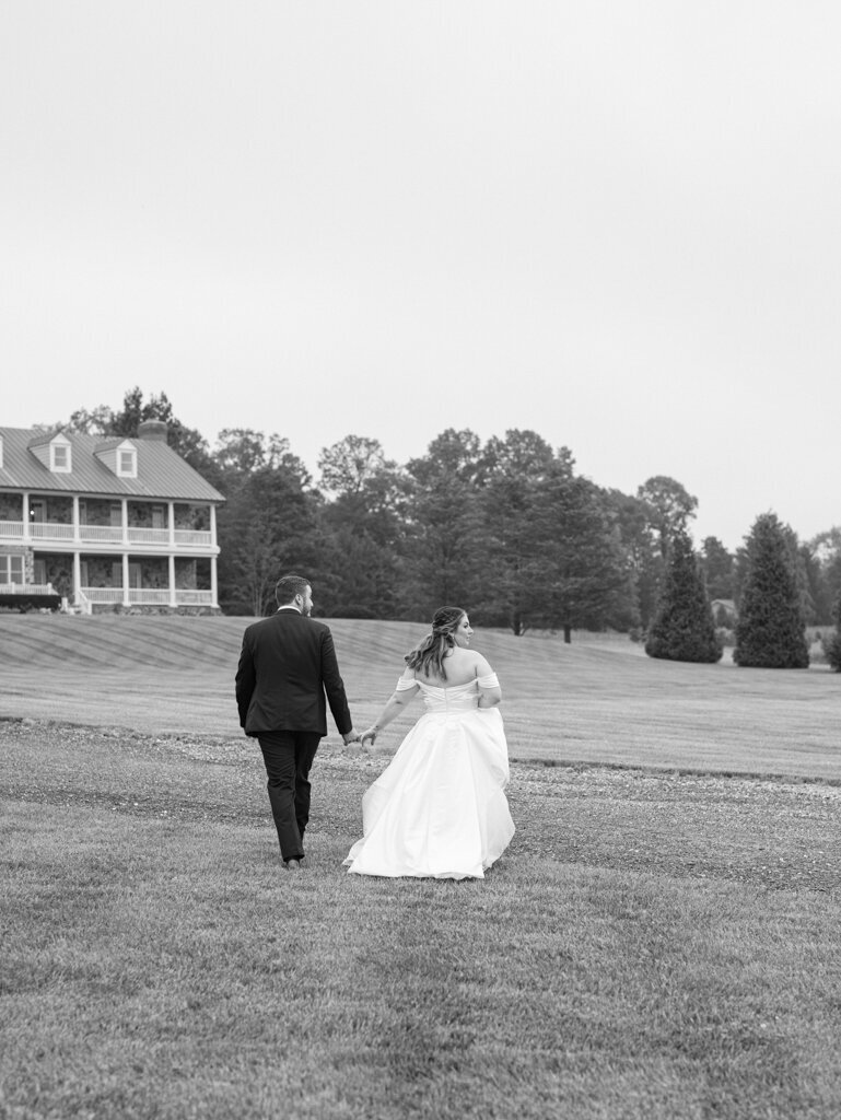 couple walking together taken by washington dc wedding photographer Nicole Simensky